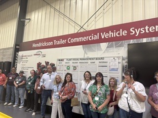2026 Educator Manufacturing Tour participants at a member manufacturer