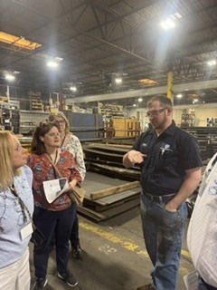 Educators learn about manufacturing careers during the 2026 Educator Manufacturing Tour